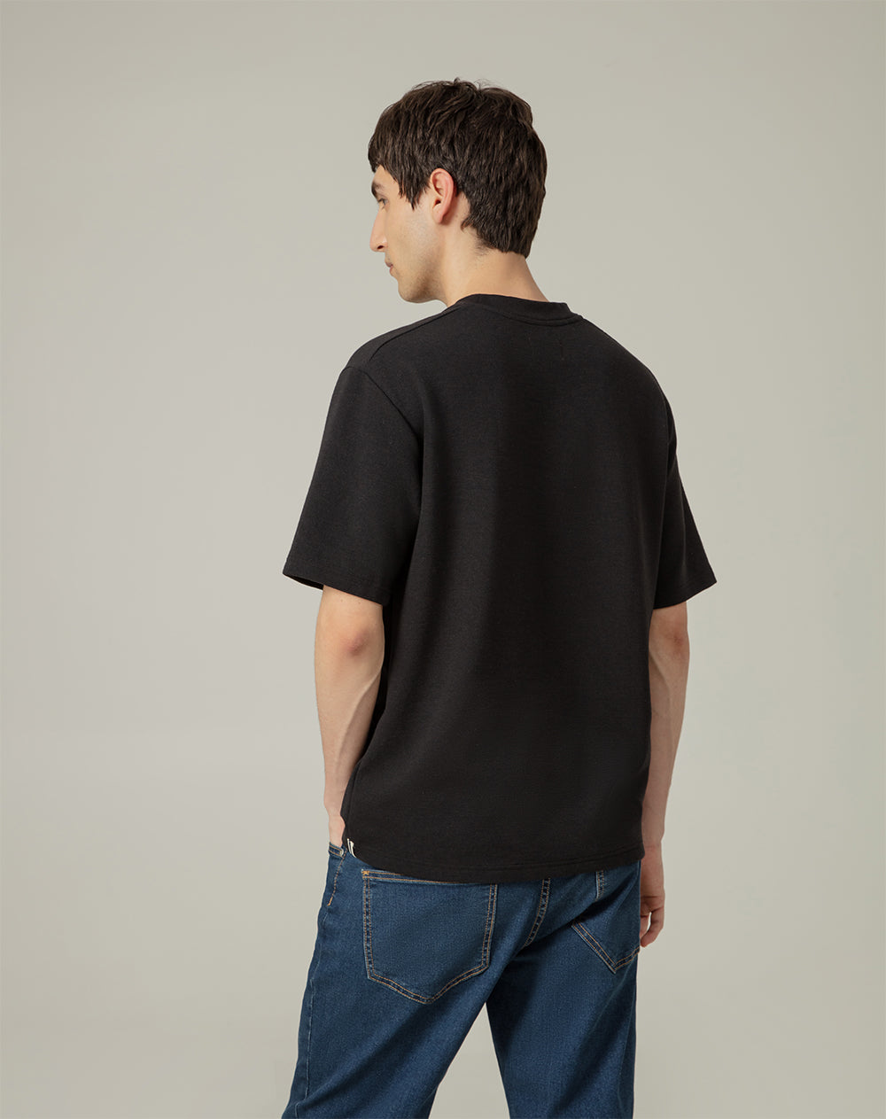 Camiseta oversized fit en tela con textura manga corta negra