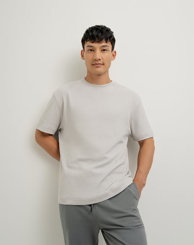 Camiseta oversized fit manga corta gris claro